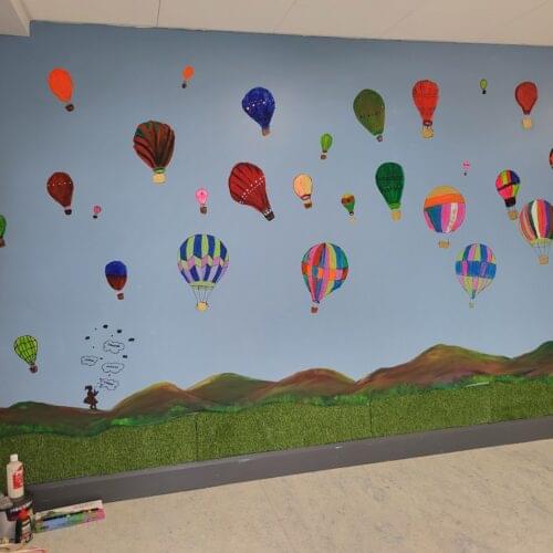 unleashing creativity and hope with a mural of hot air balloons